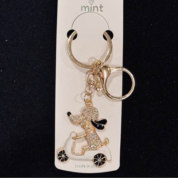 Mint Accessories - BAG CHARM Mint Gold and White Dog On Scooter Keychain
